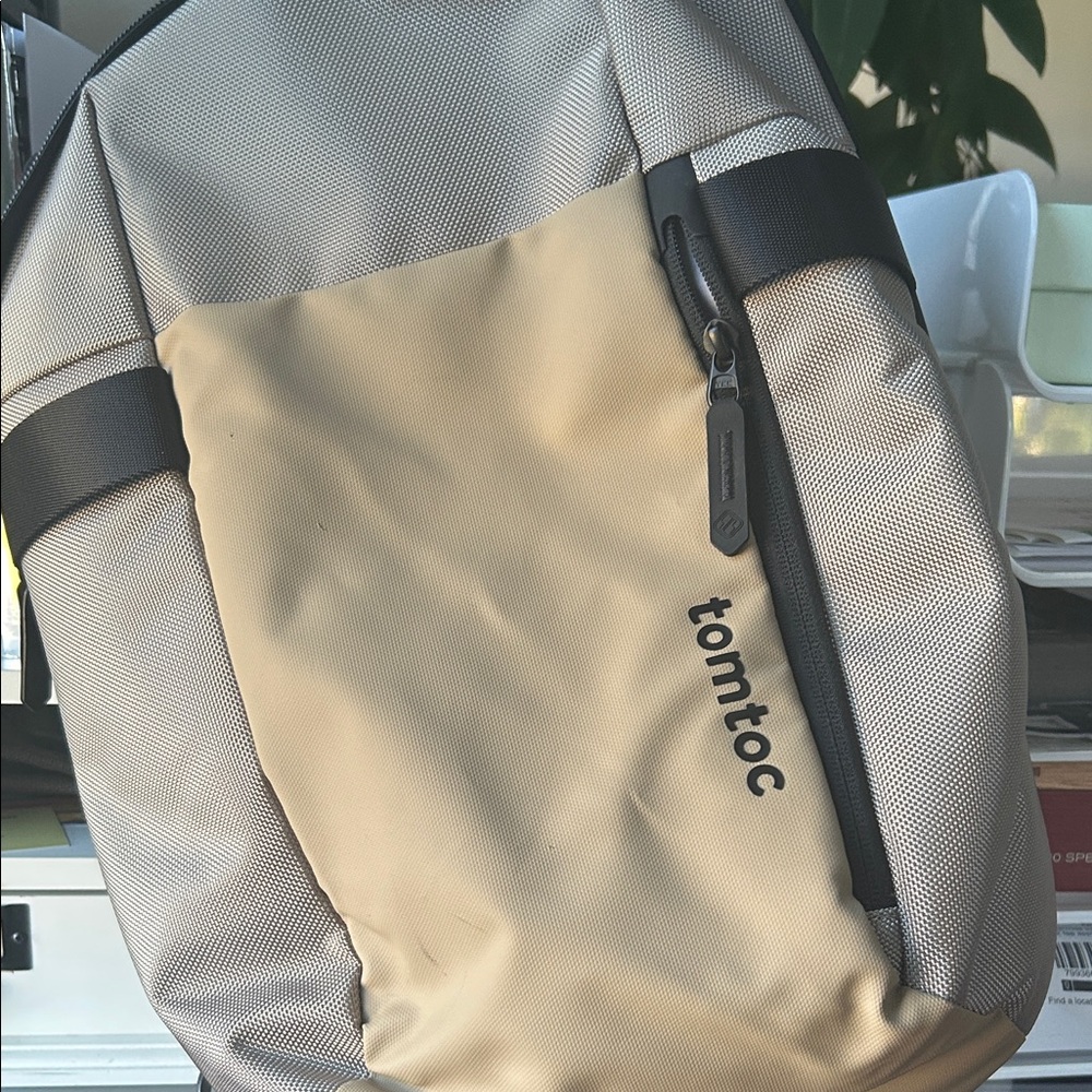 Beige and Black Tomtoc Backpack Sling Bag